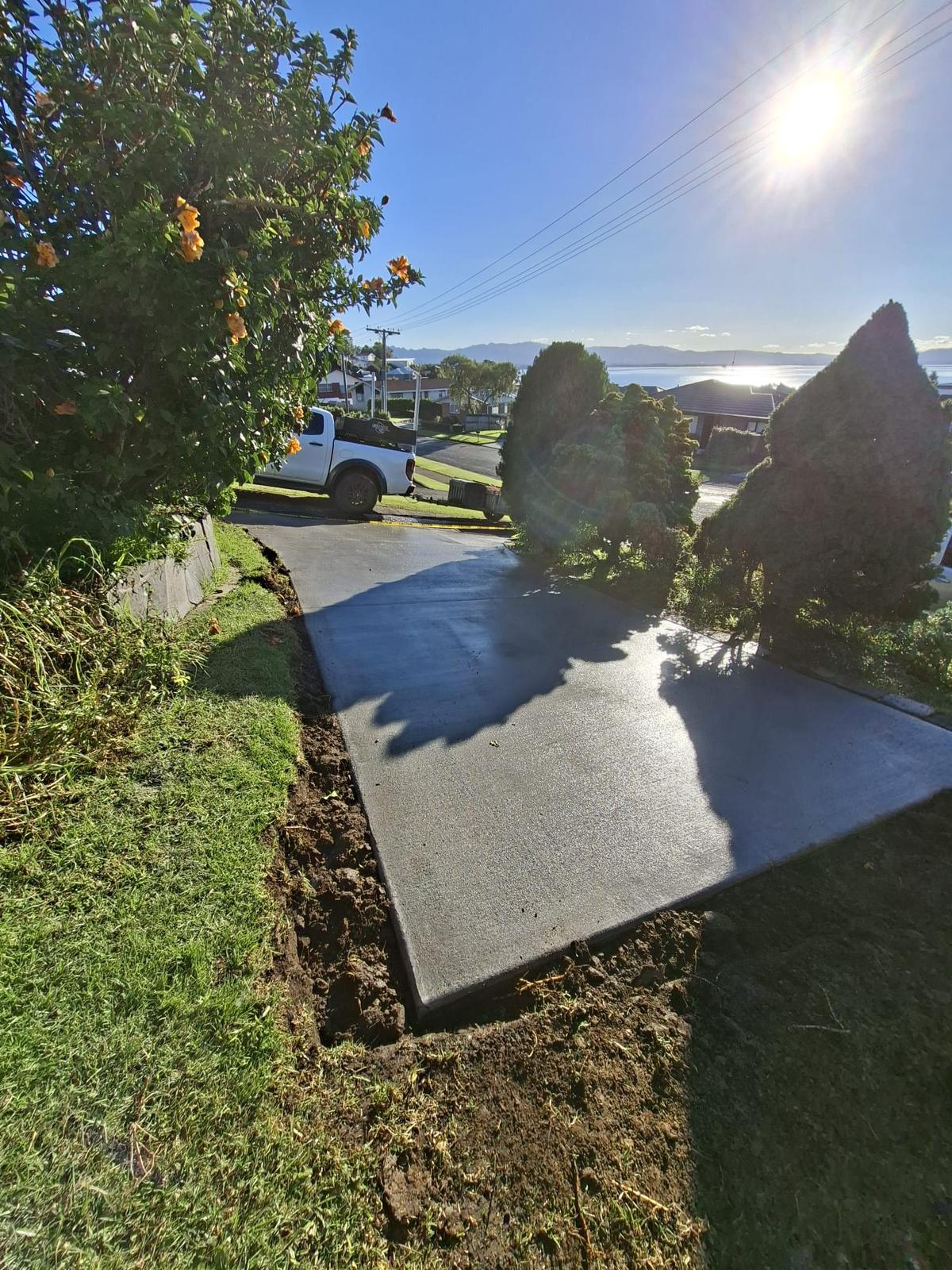 Residential concrete driveway with harbour views in Tauranga