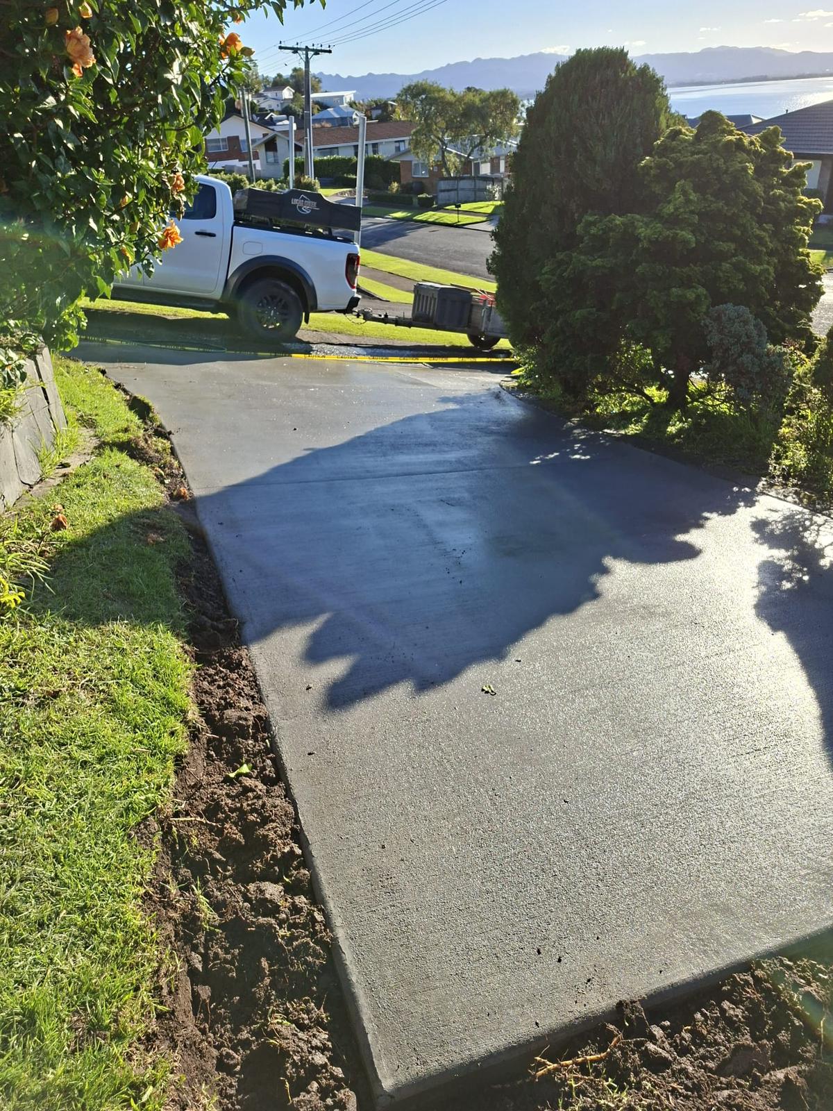 Wide residential driveway with harbour outlook in Tauranga